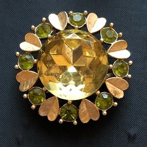 Brooch and earrings green stone gold tone detail